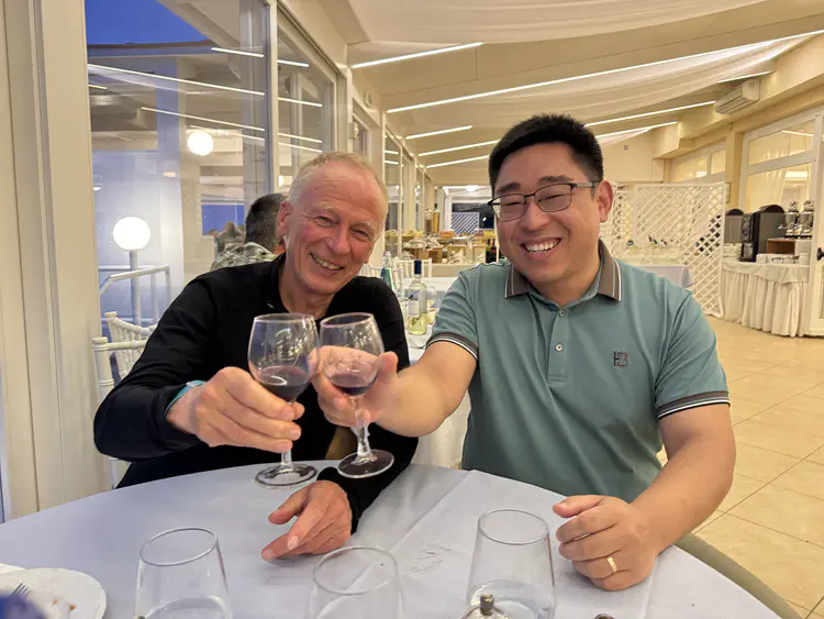 Cappo Caccia Cognitive Neuromorphic Engineering Workshop 2024 (Left: Wolfgang Maass, Right: Jibin Wu)
